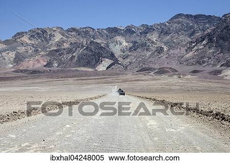 Gravel road to Devil's Golf Course, Panamint Range behind, Black Mountains, Death Valley National Park, Mojave Desert, California, USA, North America View Large Photo Image Stock Photography - Gravel road to Devil's Golf Course, Panamint Range behind, Black Mountains, Death Valley National Park, Mojave Desert, California, USA, North America. Fotosearch
