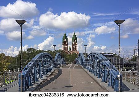 Herz Jesu church behind Wiwilibrucke, Freiburg, Baden-Wurttemberg, Germany, Europe View Large Photo Image Stock Photograph - Herz Jesu church behind Wiwilibrucke, Freiburg, Baden-Wurttemberg, Germany, Europe. Fotosearch