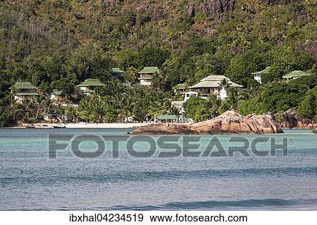 Hotel complex, bungalows, Hotel L'Archipel with Anse Gouvernement, Praslin Island, Seychelles, Africa View Large Photo Image Stock Photo - Hotel complex, bungalows, Hotel L'Archipel with Anse Gouvernement, Praslin Island, Seychelles, Africa. Fotosearch