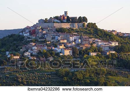 Idyllic village on hilltop with Venetian fortress in morning light, Motovun, Istria, Croatia, Europe View Large Photo Image Stock Photograph - Idyllic village on hilltop with Venetian fortress in morning light, Motovun, Istria, Croatia, Europe. Fotosearch