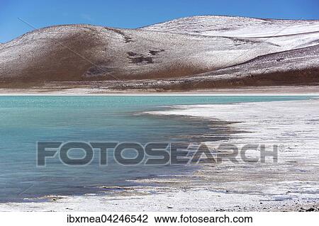 Laguna Verde, with deposits of borax on the shore and snow on the mountains, near Uyuni, Altiplano, border to Bolivia, Chile, South America View Large Photo Image Stock Image - Laguna Verde, with deposits of borax on the shore and snow on the mountains, near Uyuni, Altiplano, border to Bolivia, Chile, South America. Fotosearch