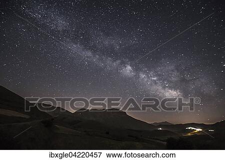 Milky Way above Castelluccio di Norcia, Monti Sibillini National Park, Umbria, Italy, Europe View Large Photo Image Stock Photo - Milky Way above Castelluccio di Norcia, Monti Sibillini National Park, Umbria, Italy, Europe. Fotosearch