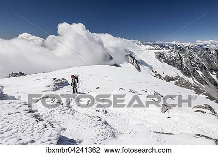Mountaineer climbing Loffler, here on summit ridge below Floitenkees, Schwarzenstein behind, Zillertal Alps, Ahrntal, Tauferer Ahrntal, Puster Valley, South Tyrol, Trentino-Alto Adige, Italy, Europe View Large Photo Image Stock Image - Mountaineer climbing Loffler, here on summit ridge below Floitenkees, Schwarzenstein behind, Zillertal Alps, Ahrntal, Tauferer Ahrntal, Puster Valley, South Tyrol, Trentino-Alto Adige, Italy, Europe. Fotosearch