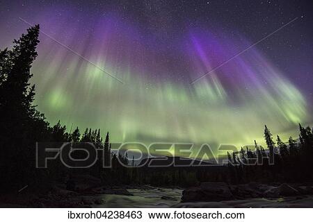 Northern Lights or Aurora Borealis over the river Gamajahka or Kamajakka, Kvikkjokk, Lapland, Sweden, Europe View Large Photo Image Stock Image - Northern Lights or Aurora Borealis over the river Gamajahka or Kamajakka, Kvikkjokk, Lapland, Sweden, Europe. Fotosearch