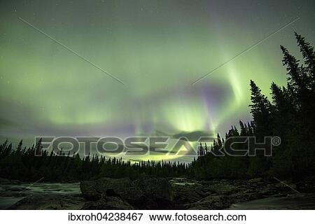 Northern Lights or Aurora Borealis over the river Gamajahka or Kamajakka, Kvikkjokk, Lapland, Sweden, Europe View Large Photo Image Stock Photo - Northern Lights or Aurora Borealis over the river Gamajahka or Kamajakka, Kvikkjokk, Lapland, Sweden, Europe. Fotosearch