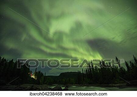 Northern Lights or Aurora Borealis over the river Gamajahka or Kamajakka, Kvikkjokk, Lapland, Sweden, Europe View Large Photo Image Stock Photo - Northern Lights or Aurora Borealis over the river Gamajahka or Kamajakka, Kvikkjokk, Lapland, Sweden, Europe. Fotosearch