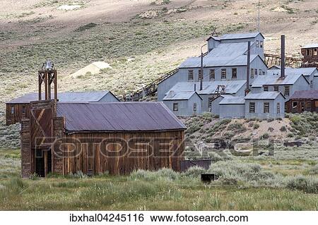 Old mining building behind old wooden houses, ghost town, old gold mining town, Bodie State Historic Park, Bodie, California, USA, North America View Large Photo Image Stock Photograph - Old mining building behind old wooden houses, ghost town, old gold mining town, Bodie State Historic Park, Bodie, California, USA, North America. Fotosearch
