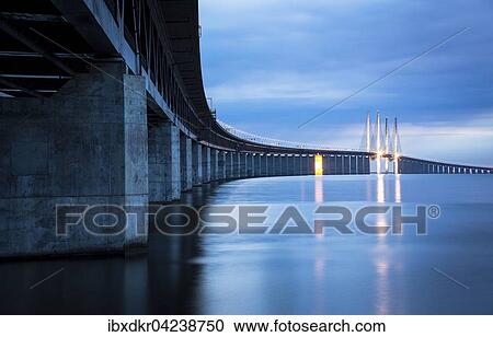 Oresund Bridge, Oresundsbroen, world's longest cable-stayed bridge connecting Copenhagen with Malmo, Denmark, Sweden, Europe View Large Photo Image Stock Image - Oresund Bridge, Oresundsbroen, world's longest cable-stayed bridge connecting Copenhagen with Malmo, Denmark, Sweden, Europe. Fotosearch