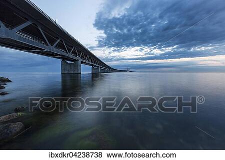 Oresund Bridge, Oresundsbroen, world's longest cable-stayed bridge connecting Copenhagen with Malmo, Denmark, Sweden, Europe View Large Photo Image Stock Photo - Oresund Bridge, Oresundsbroen, world's longest cable-stayed bridge connecting Copenhagen with Malmo, Denmark, Sweden, Europe. Fotosearch