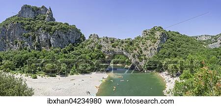 Pont d'Arc natural arch, kayaks on Ardeche river, Vallon-Pont-d'Arc, Rhone-Alpes, France, Europe View Large Photo Image Stock Image - Pont d'Arc natural arch, kayaks on Ardeche river, Vallon-Pont-d'Arc, Rhone-Alpes, France, Europe. Fotosearch