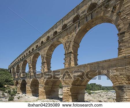 Stock Photo - Pont du Gard, ancient Roman aqueduct, Vers-Pont-du-Gard, Languedoc-Roussillon, France, Europe. Fotosearch