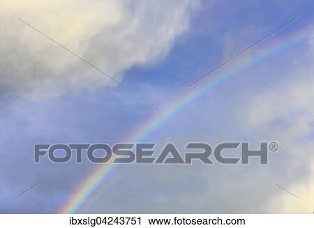 Rainbow, blue sky and clouds, Bavaria, Germany, Europe View Large Photo Image Stock Image - Rainbow, blue sky and clouds, Bavaria, Germany, Europe. Fotosearch