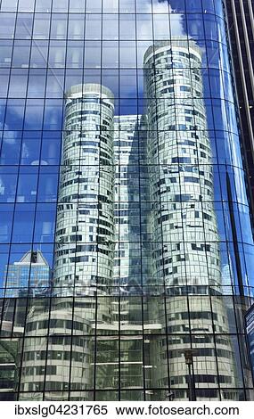 Reflection of office skyscraper in glass facade in La Defense, Nanterre, Paris, Hauts de Seine, France, Europe View Large Photo Image Stock Photography - Reflection of office skyscraper in glass facade in La Defense, Nanterre, Paris, Hauts de Seine, France, Europe. Fotosearch