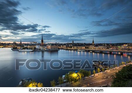 Stock Photo - Riddarholmen island at dusk, view from Monteliusvagen, Stockholm, Stockholm County, Sweden, Europe. Fotosearch