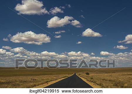Road with cloudy sky, Plateau Isalo at Ranohira, Madagascar, Africa View Large Photo Image Stock Photography - Road with cloudy sky, Plateau Isalo at Ranohira, Madagascar, Africa. Fotosearch