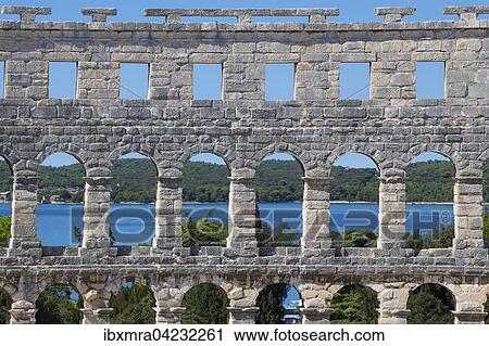 Roman amphitheater with arches, Adriatic Sea behind, Pula, Istria, Croatia, Europe View Large Photo Image Stock Image - Roman amphitheater with arches, Adriatic Sea behind, Pula, Istria, Croatia, Europe. Fotosearch