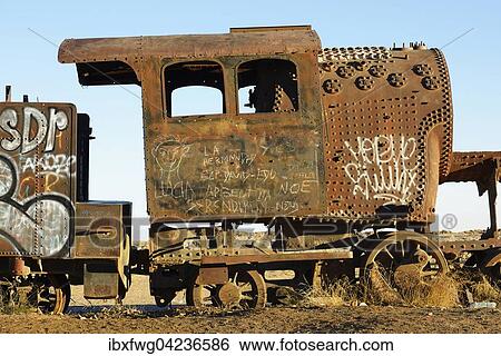Rusted locomotive, Cementerio de Trenes train cemetery, Uyuni Municipality, Department of Potosi, Altiplano, Vysocina Region, Bolivia, South America View Large Photo Image Stock Photograph - Rusted locomotive, Cementerio de Trenes train cemetery, Uyuni Municipality, Department of Potosi, Altiplano, Vysocina Region, Bolivia, South America. Fotosearch