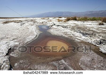 Stock Photo - Salt Basin, near Furnace Creek, Panamint Range behind, Black Mountains, Death Valley National Park, Mojave Desert, California, USA, North America. Fotosearch
