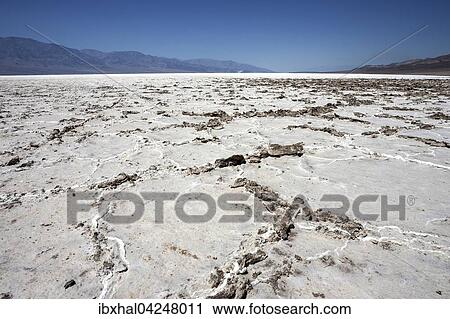 Salt crust in Badwater Basin salt pan, lowest point in North America, Panamint Range left, Black Mountains, Death Valley, Mojave Desert, California, USA, North America View Large Photo Image Stock Image - Salt crust in Badwater Basin salt pan, lowest point in North America, Panamint Range left, Black Mountains, Death Valley, Mojave Desert, California, USA, North America. Fotosearch