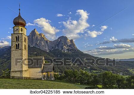 San Valentino church in front of the Schlern at sunset, Siusi allo Sciliar, Castelrotto, Dolomites, Italy, Europe View Large Photo Image Stock Photography - San Valentino church in front of the Schlern at sunset, Siusi allo Sciliar, Castelrotto, Dolomites, Italy, Europe. Fotosearch