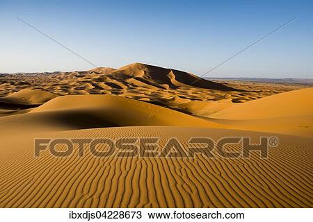 Stock Image - Sand dunes at Merzouga, Meknes-Tafilalet Region, Erg Chebbi, northern Sahara, Morocco, Africa. Fotosearch