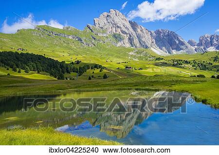 Seceda peak reflected in Lech Sant or Holy Lake, Odle range, Dolomites, Italy, Europe View Large Photo Image Stock Image - Seceda peak reflected in Lech Sant or Holy Lake, Odle range, Dolomites, Italy, Europe. Fotosearch