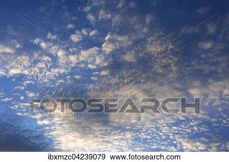 Stock Photo - Small fluffy clouds (Cirrocumulus), Tyrol, Austria, Europe. Fotosearch