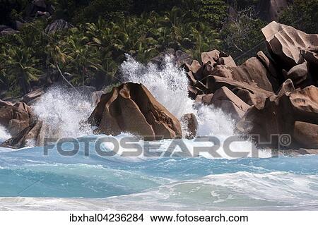 Strong surf, churning sea, granite rocks, Grand Anse, La Digue Island, Indian Ocean, Seychelles, Africa View Large Photo Image Picture - Strong surf, churning sea, granite rocks, Grand Anse, La Digue Island, Indian Ocean, Seychelles, Africa. Fotosearch