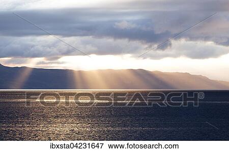 Sunbeams over Isle of Sky, Scotland View Large Photo Image Stock Photo - Sunbeams over Isle of Sky, Scotland. Fotosearch