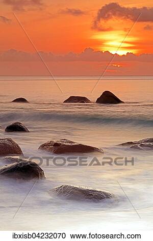 Stock Image - Sunset at Anse Lazio, Praslin Island, Seychelles, Africa. Fotosearch