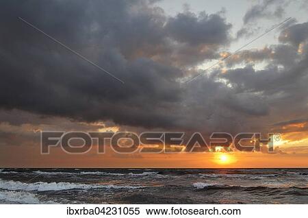 Sunset on the western beach, Darss, Western Pomerania Lagoon Area National Park, Mecklenburg-Western Pomerania, Germany, Europe View Large Photo Image Stock Photography - Sunset on the western beach, Darss, Western Pomerania Lagoon Area National Park, Mecklenburg-Western Pomerania, Germany, Europe. Fotosearch