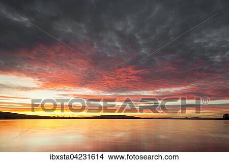 Sunset over Lake Constance, view from Hegne, evening light, Baden-Wurttemberg, Germany, Europe View Large Photo Image Picture - Sunset over Lake Constance, view from Hegne, evening light, Baden-Wurttemberg, Germany, Europe. Fotosearch