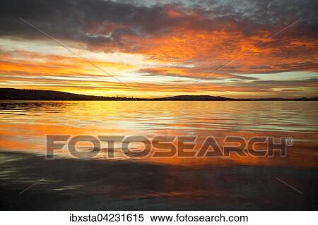 Sunset over Lake Constance, view from Hegne, evening light, Baden-Wurttemberg, Germany, Europe View Large Photo Image Stock Photography - Sunset over Lake Constance, view from Hegne, evening light, Baden-Wurttemberg, Germany, Europe. Fotosearch