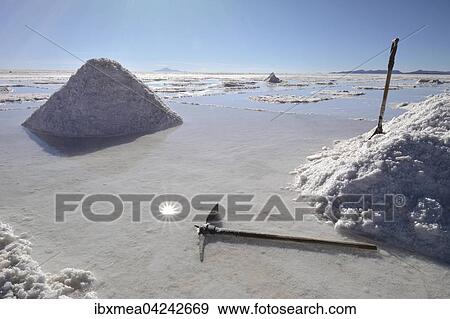 Traditional salt mining with pick and shovel, on the salt lake Salar de Uyuni, Altiplano, Bolivia, South America View Large Photo Image Stock Photo - Traditional salt mining with pick and shovel, on the salt lake Salar de Uyuni, Altiplano, Bolivia, South America. Fotosearch