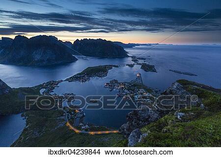 View from Reinebringen, Reinebriggen, 442m, midnight sun, towards Hamnoy, Reine and Reinefjord with mountains, Moskenes, Moskenesoy, Lofoten, Norway, Europe View Large Photo Image Picture - View from Reinebringen, Reinebriggen, 442m, midnight sun, towards Hamnoy, Reine and Reinefjord with mountains, Moskenes, Moskenesoy, Lofoten, Norway, Europe. Fotosearch