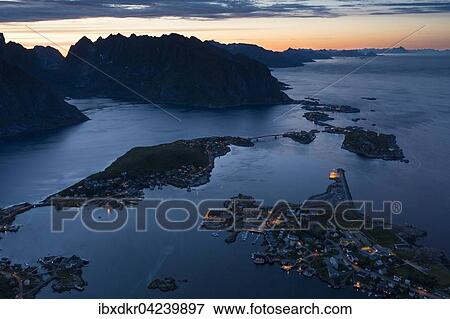 View from Reinebringen, Reinebriggen, 442m, midnight sun, towards Hamnoy, Reine and Reinefjord with mountains, Moskenes, Moskenesoy, Lofoten, Norway, Europe View Large Photo Image Stock Photo - View from Reinebringen, Reinebriggen, 442m, midnight sun, towards Hamnoy, Reine and Reinefjord with mountains, Moskenes, Moskenesoy, Lofoten, Norway, Europe. Fotosearch