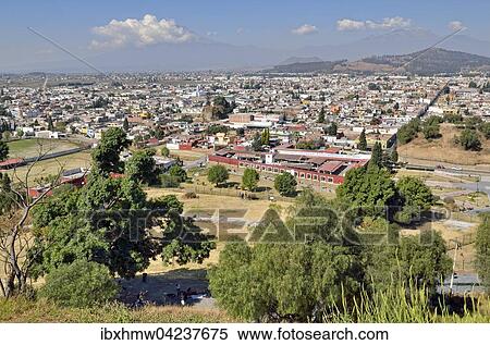 View from the Pyramid Tepanapa to the city of Cholula, Mount Popocatepetl behind, Itztaccihuatl on the right, Puebla, Mexico, North America View Large Photo Image Stock Photography - View from the Pyramid Tepanapa to the city of Cholula, Mount Popocatepetl behind, Itztaccihuatl on the right, Puebla, Mexico, North America. Fotosearch