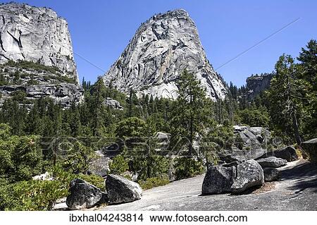 Picture - View from the trail at Emerald Pool, Mt. Broderick on the left, Liberty Cap in the middle, Yosemite National Park, USA, North America. Fotosearch