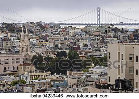 View of San Francisco houses from Russian Hill, Oakland Bay Bridge behind, San Francisco, California, USA, North America View Large Photo Image Stock Photograph - View of San Francisco houses from Russian Hill, Oakland Bay Bridge behind, San Francisco, California, USA, North America. Fotosearch