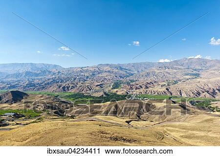 View over Rajaei Dasht village in green valley, mountains around Moallem Kalayeh, Alamut region, Qazvin province, Alborz, Iran, Asia View Large Photo Image Stock Image - View over Rajaei Dasht village in green valley, mountains around Moallem Kalayeh, Alamut region, Qazvin province, Alborz, Iran, Asia. Fotosearch