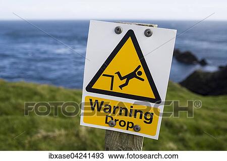 Stock Image - Warning Drop sign, Sumburgh, Shetland Islands, United Kingdom, Europe. Fotosearch