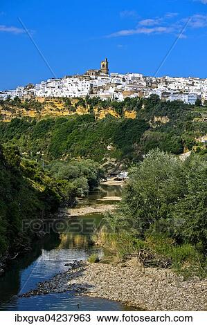 White Town or Pueblo Blanco, Arcos de la Frontera above Rio Guadalete, Andalucia, Spain, Europe View Large Photo Image Stock Image - White Town or Pueblo Blanco, Arcos de la Frontera above Rio Guadalete, Andalucia, Spain, Europe. Fotosearch