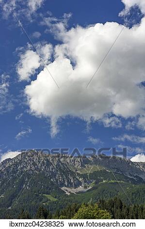 Wilder Kaiser or Wild Kaiser, cloudy sky, Scheffau, Tyrol, Austria, Europe View Large Photo Image Stock Photography - Wilder Kaiser or Wild Kaiser, cloudy sky, Scheffau, Tyrol, Austria, Europe. Fotosearch