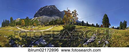 Stock Photograph - 360 ° panoramic view in autumn, as seen from Schachentor mountain near Schachenhaus, Garmisch-Partenkirchen, Wetterstein mountain range, Bavaria, Germany, Europe. Fotosearch