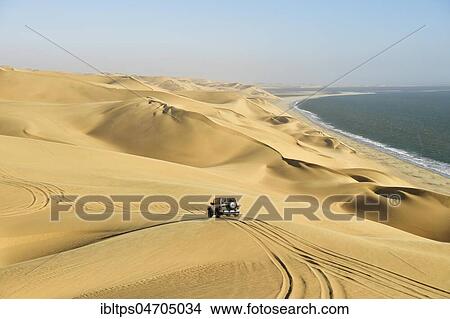 4x4 drives over the sand dunes, Namib Desert, Namibia, Africa View Large Photo Image Picture - 4x4 drives over the sand dunes, Namib Desert, Namibia, Africa. Fotosearch