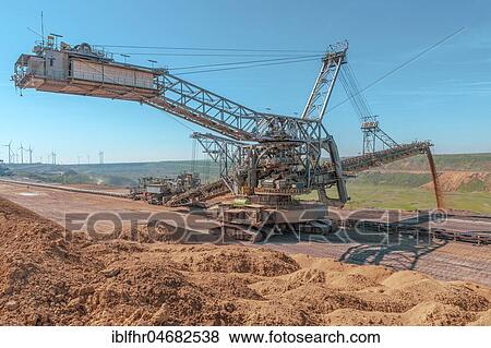 750 spreaders filling the remaining hole, opencast mine Garzweiler, opencast lignite mine, Jüchen, Rheinisches Braunkohlerevier, North Rhine-Westphalia, Germany, Europe View Large Photo Image Stock Photo - 750 spreaders filling the remaining hole, opencast mine Garzweiler, opencast lignite mine, Jüchen, Rheinisches Braunkohlerevier, North Rhine-Westphalia, Germany, Europe. Fotosearch
