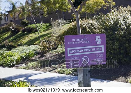 Stock Photo - A sign warns against drinking recycled water that is used for irrigation; recycled or reclaimed water is wastewater that is treated to be safe for various uses short of drinking, Chula Vista, California, USA, North America. Fotosearch