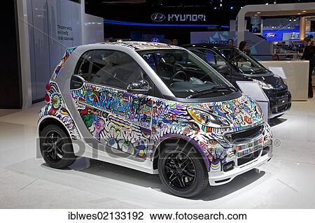 Stock Image - A Smart car designed by "Bill the Artist" on display at the North American International Auto Show, Detroit, Michigan, USA, North America. Fotosearch