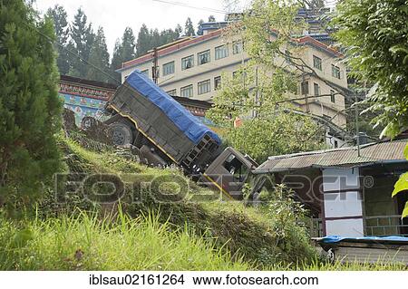 Accident, truck having crashed down a slope, Rumtek Monastery near Gangtok, Sikkim Himalayas, India, South Asia, Asia View Large Photo Image Picture - Accident, truck having crashed down a slope, Rumtek Monastery near Gangtok, Sikkim Himalayas, India, South Asia, Asia. Fotosearch