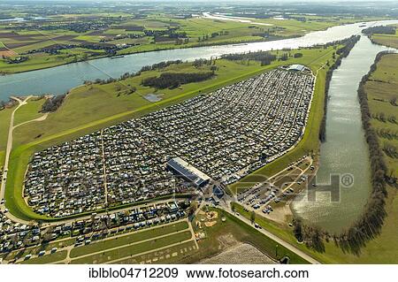 Stock Photo - Aerial view, campground Grav-Insel am Niederrhein, largest camping site in Germany, Wesel, Rhineland, North Rhine-Westphalia, Germany, Europe. Fotosearch